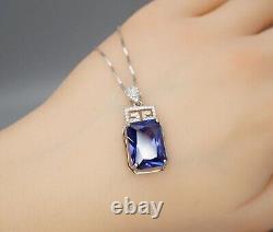 14k White Gold Plated 4 Ct Emerald Cut Simulated Blue Sapphire Solitaire Pendant