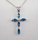 14k White Gold Plated Marquise Cut Simulated Blue Topaz Cross Pendant With Chain