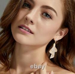 18k White Gold GF Long Swirl Earrings Simulated Diamond Stone Designer Inspired