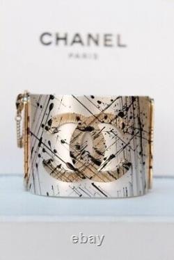 2013 CHANEL Beautiful cuff with CC logo and paint chip