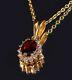 2.50 Ct Oval Cut Lab Created Red Ruby Halo Pendant In 14k Yellow Gold Plated