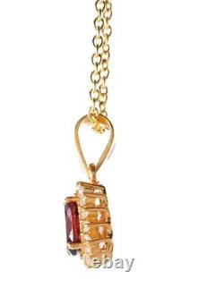 2.50 Ct Oval Cut Lab Created Red Ruby Halo Pendant In 14K Yellow Gold Plated