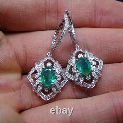 4Ct Oval Cut Simulated Emerald Drop Dangle Earrings 14k White Gold Plated Silver