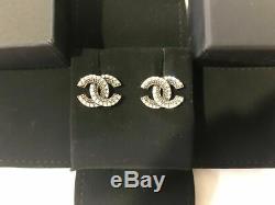 Authentic Chanel 2019 CC Logo Crystal Gold Tone Brass Earrings Studs Aged Finish
