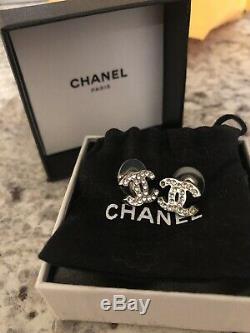 Authentic Chanel CC logo crystal stud earrings