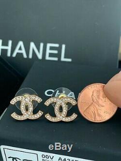 Authentic Chanel Classic CC Logo Crystal gold Tone Earrings Studs