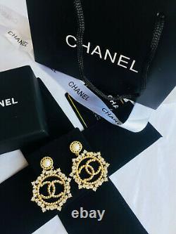 Authentic Chanel earrings CC logo hoop dangle RARE Round