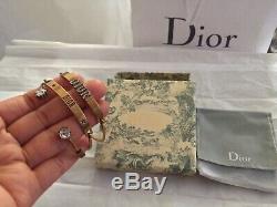 Authentic Christian Dior DIO(R)EVOLUTION CRYSTAL AGED GOLD FINISH BRACELETS