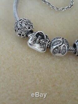 Authentic pandora charm bracelet pre-owned With charms! BEAUTIFUL! Size 19
