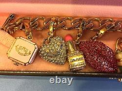 BEAUTIFUL Juicy Couture Charm Bracelet with 6 retired charms