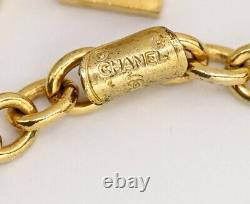 CHANEL Logo charm Necklace 35 inch long Gold Tone Vintage Authentic k523