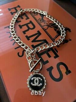 Chanel pendant and gold choker necklace