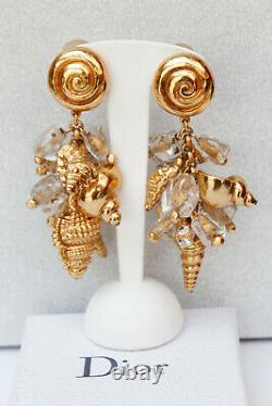 Christian Dior Lovely gilted metal drop clip on earrings with shell charms