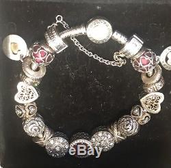 PANDORA Silver Bracelet with gold clasp and 18 beautiful charms