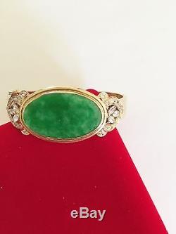 Very beautiful 14K Yellow Gold Oval Jade and CZs Bangle bracelet