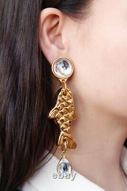 Yves Saint Laurent Beautiful clip on earrings with golden fishes