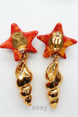 Yves Saint Laurent Beautiful earrings with orange starfish and golden shell